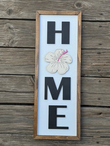 HOME with hibiscus sign