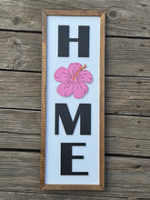 HOME with hibiscus sign